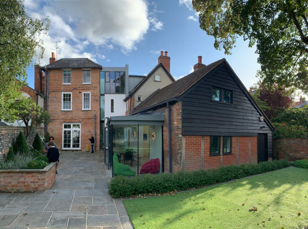 Large rear house extension in Cumbria featuring matching masonry and professional finishes.
